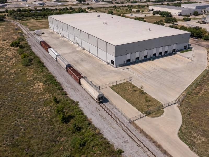 ALTA Survey showing rail spur access beside an industrial warehouse in Fort Worth Texas